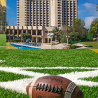 Kraft Family Sports Campus (KFSC) jossa alustana sekä turf että luonnonnurmi ja majoituspaikkana upea Ramada Renaissance Hotel